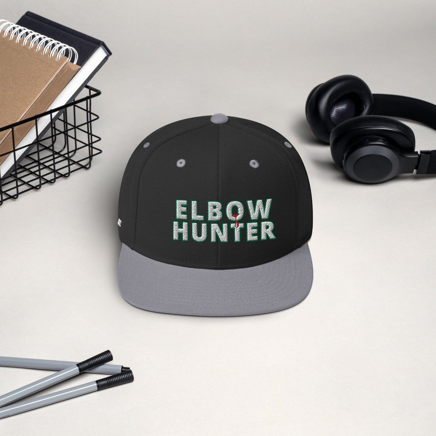 ELBOW HUNTER Snapback Hat